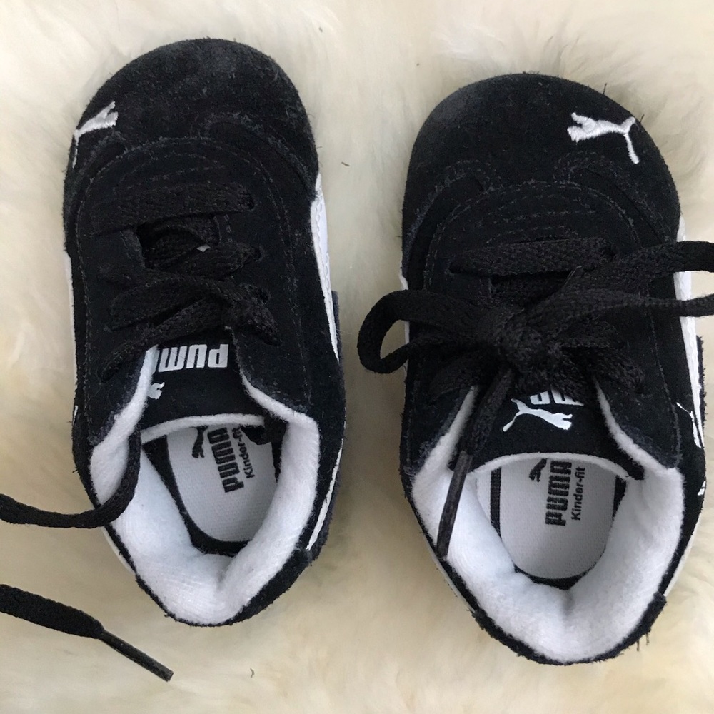 Baby pumas black size 4